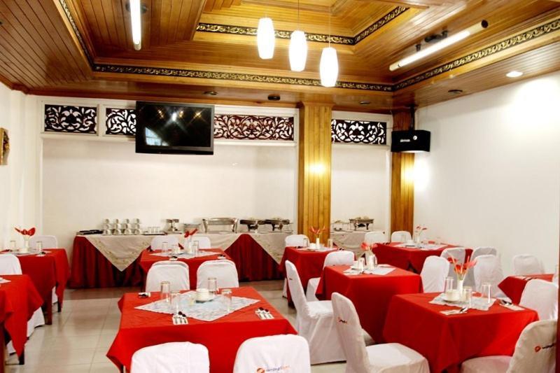 Ambun Suri Hotel Букиттинги Экстерьер фото